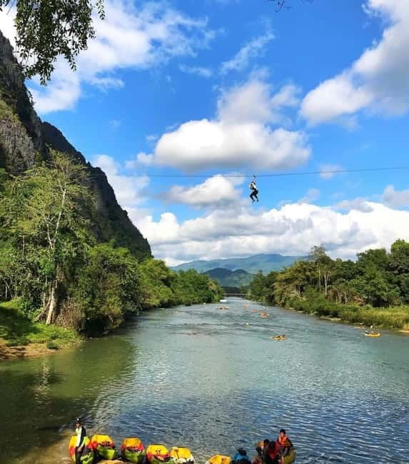 From Vientiane: Vang Vieng Tour with Cave Kayak & Zipline - Jang Cave sets the tone with rocks and local history