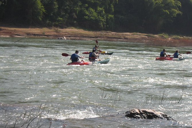FULL DAY – Kuang Si Waterfall, Kayak on the Nam Ou / Mekong River, Pak Ou Caves - Lunch beside the Mekong at Manifa Elephant Camp