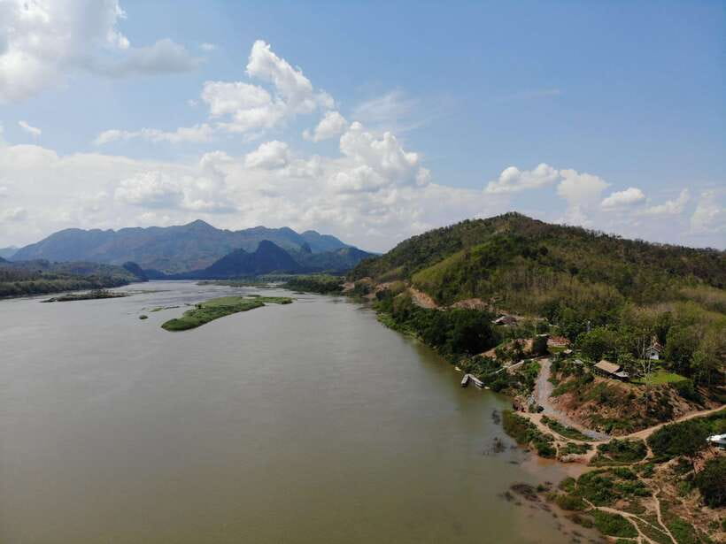 Half Day Mekong Cruise to Pak Ou Caves (Morning / Afternoon) - Boarding the boat on the Mekong
