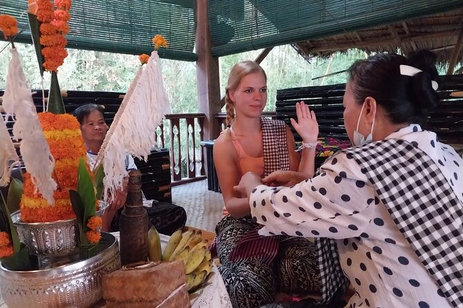 Home-cooked dinner & Baci ceremony with Villagers in Ban Nasang - The Baci ceremony in a village home