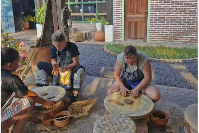 Luang Prabang Cooking, Pottery & Candle Experience - Cooking Lao food with Nid and Noy