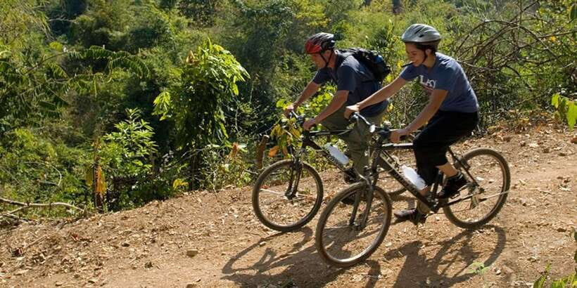 Luang Prabang: Countryside Mountain Bike Tour with Lunch - The Ferry and the Nam Khan Finish