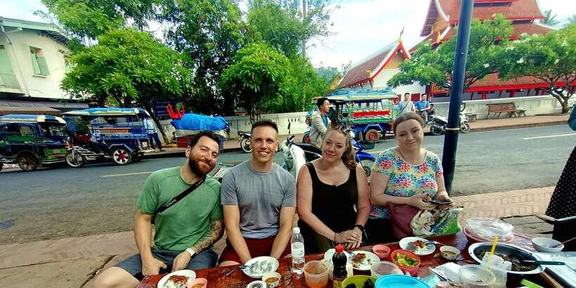 Luang Prabang: Foodie Walking Tour & Monk Blessing - Entering an ancient temple for the monk blessing