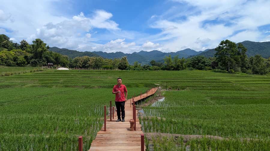 Luang Prabang: Full Day Trek to Kuang Si Waterfall & Village - Arriving at the three-tiered Kuang Si Falls