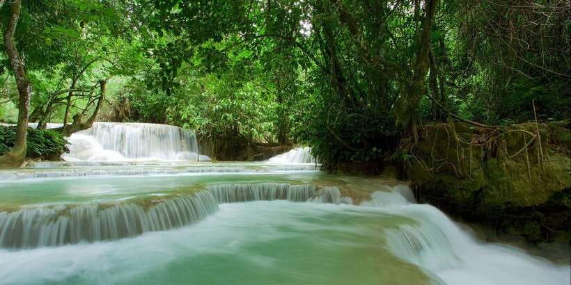 Luang Prabang: Kuang Si Bike Ride & Long-Tail Boat Cruise - Kuang Si Falls and its jungle pools