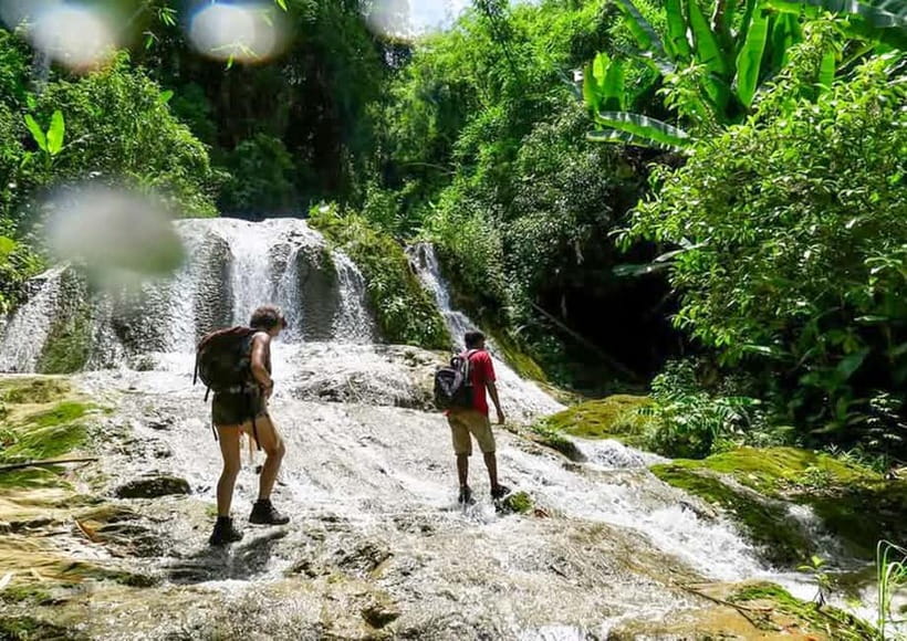 Nong Khiaw: 100 Waterfalls, Nam Ou & Khmu Village Day Tour - Walking through rice paddies and running water