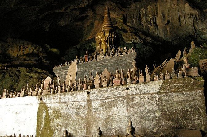 Pak Ou Caves and Kuang Si Fall Day Tour - Entering the Buddha-filled Pak Ou Caves