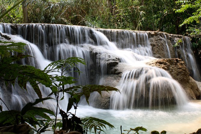Private Tour Full-day Morning Market, Villages and Scenic Kuang Si Waterfall - Ban Phanom and Wat Siphouthabath may complete the return