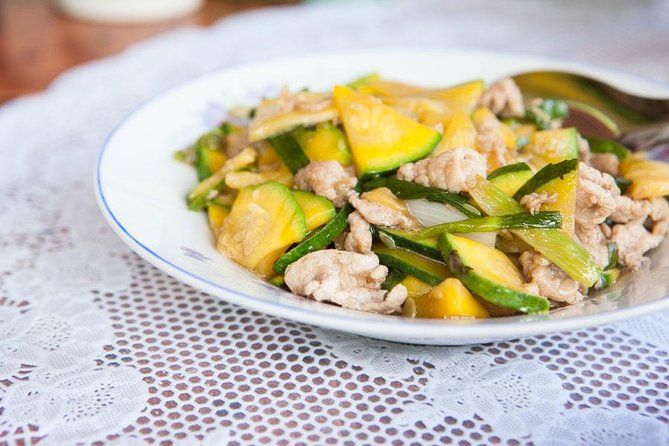 Traditional Market Tour and Private Laotian Cooking Class with a Local - Sitting Down to a Home-Cooked Lao Meal
