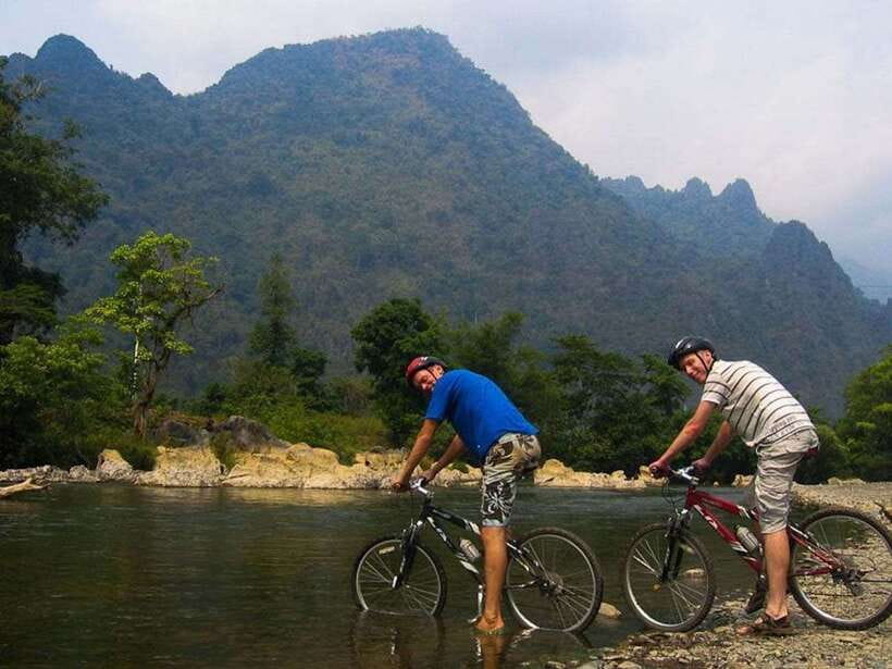 Vang Vieng: Blue Lagoon and Countryside Bike Tour with Lunch - Hiking to Phu Kham Cave