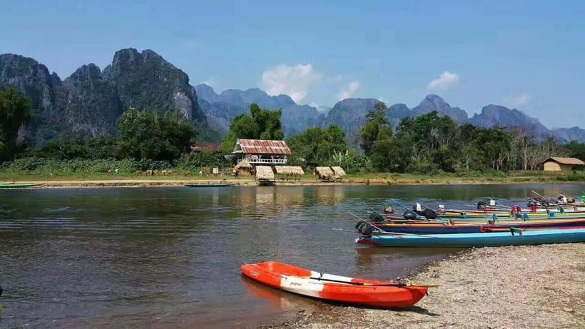 Vang Vieng: Day Tour with Kayaking, Ziplining, and Rafting - Cooling off at Blue Lagoon 1