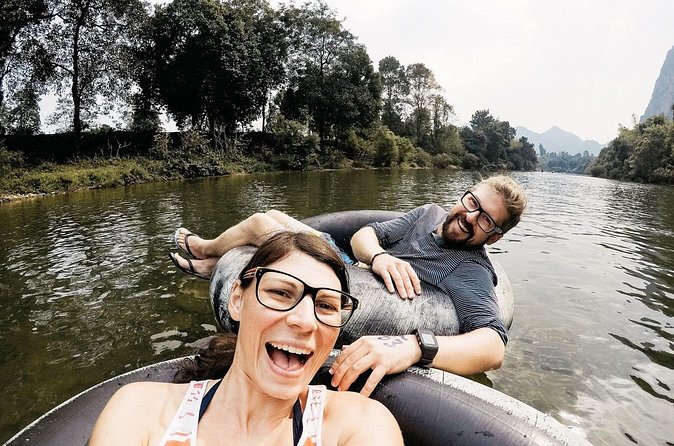 Vang Vieng Kayaking Fun Rapid and Float Tour - Paddling through small rapids on the Nam Song